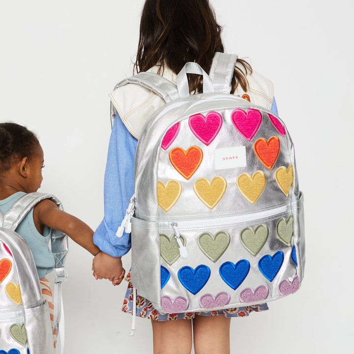 >State Bags Kane Kids Double Pocket Backpack - Metallic Fuzzy Hearts