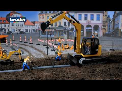 >Bruder 02467 Cat Mini Excavator with a Worker 16.1 x 6.4 x 7.1 inch